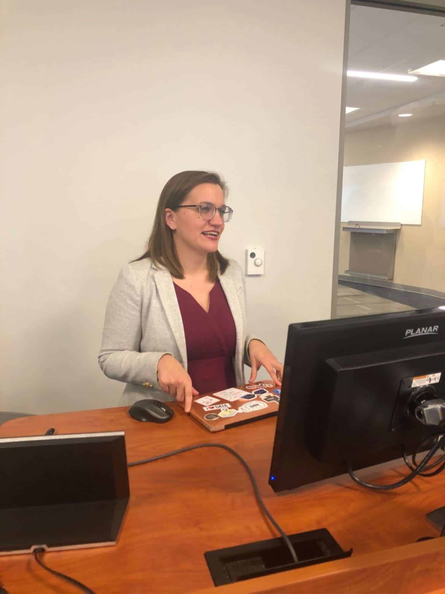 Public health professionals engaged in AI training session